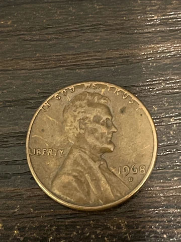 1968 D Lincoln Penny with Error on Top Rim, &"L" in Liberty on Edge Touching "I" Cover