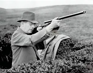 1957 Wire Photo British Prime Minister Harold Macmillan shoots shotgun at Masham - Picture 1 of 2