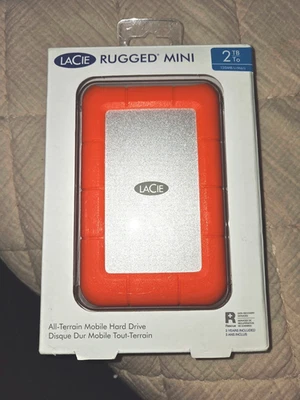 LaCie Rugged Mini 2 TB Portable Hard Drive, External, Orange, Silver - Image 1 of 3