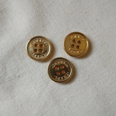 CHAPS Replacement Buttons Gold Tone 4 Holes Flat Spell Out Set Of 3  - Image 1 of 4