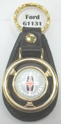 Mini volante LINCOLN CONTINENTAL dorado blanco cuero negro llavero Foto 1 de 4