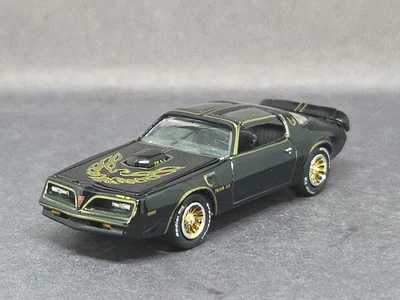 Pontiac Firebird 1977 transmisión AM T/A coleccionable para adultos 1/64 edición limitada negro  Foto 1 de 4