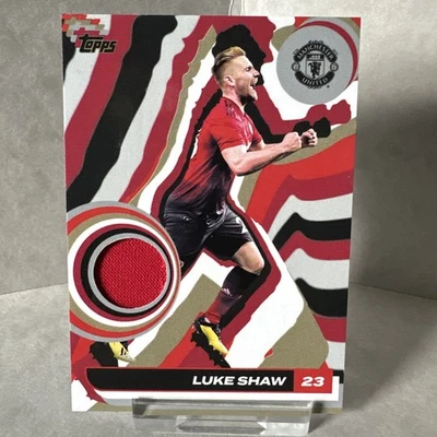 Topps Manchester United Team Set 2024/25 Luke Shaw Player Worn Patch - Image 1 of 2