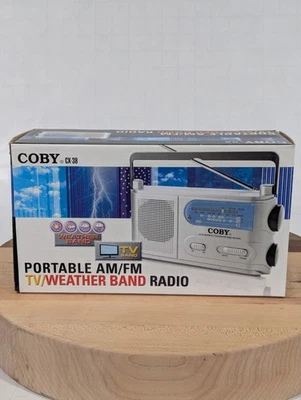 2006 Coby CX-38 Portable AM FM TV / Weather Band Radio - New In Box - Image 1 of 4