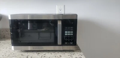 Horno microondas Black & Decker 0,9 pies cúbicos 900 vatios acero inoxidable  Foto 1 de 4