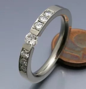 DISEÑO MADURO - ELEGANTE ANILLO DE TENSIÓN BRILLANTE 0,58 QUILATES - ÚNICO - 500 PALADIO - Imagen 1 de 6