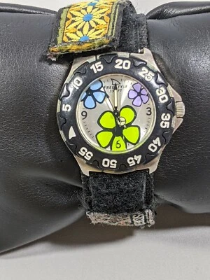 Reloj estilo libre azul amarillo púrpura flor bisel giratorio correa lona  Foto 1 de 4