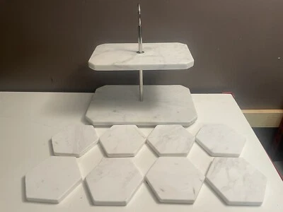 Juego de 8 soportes para servir de mármol blanco de 2 niveles con posavasos hexagonales Foto 1 de 4