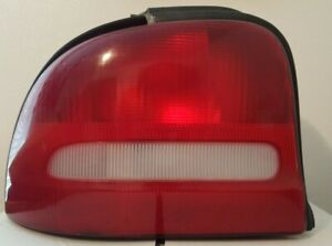 TAIL LIGHT LENS REAR DRIVER'S SIDE FOR 1997 DODGE NEON USED - BULBS NOT INCLUDED
