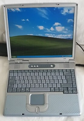 Samsung A10 Laptop 14.1" 256MB 40GB IDE AMD Duron Windows XP Parallel Floppy CD - Image 1 of 4