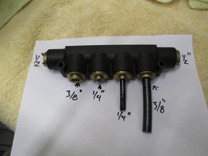 Parker Manifold, Push 2 Connect, (2)1/2" Inlets, (2)3/8" Outs, (2)1/4" Outs, C6 - Picture 1 of 6