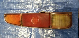 1973 Jeep J series Rear Tail Light w/housing LH. Used Ad#9511 - Picture 1 of 11