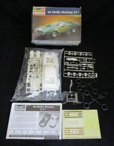 Revell-Monogram ~ '69 Shelby Mustang ~ 2'n1 ~ Modello 85-2545 ~ Parzialmente Sigillato - Foto 1 di 1