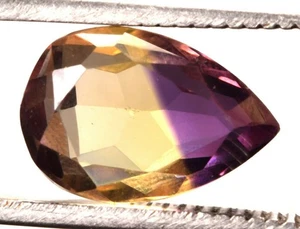 9,85 Cts. Piedra preciosa natural bicolor Bolivia con forma de pera ametrino certificada - Imagen 1 de 4