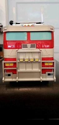 Camión AMC Transformers Rise Of The Beasts palomitas de maíz cubo de hojalata Optimus Prime nuevo Foto 1 de 4