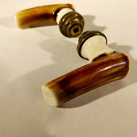 antique door handles pair - ceramic and brass - antlers shape - marked G. F Cover