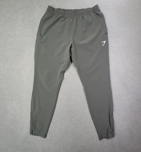 Gymshark Jogginghose Herren mittelgrau einfarbig Knöchel Reißverschluss Kordelzug leichtes Logo - Bild 1 von 11