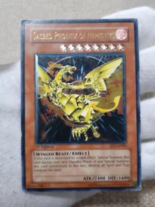 Sacred Phoenix of Nephthys FET-AE005 1st ED Ultimate Rare YuGiOh Asia English - Picture 1 of 7