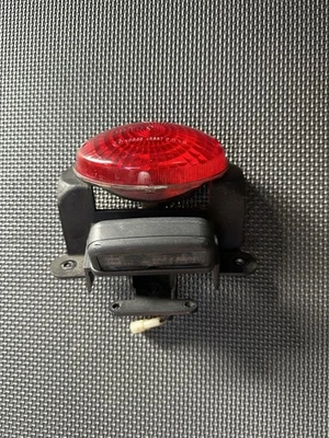 Aprilia RS 125 96-98 Luz de freno trasera y soporte Foto 1 de 3