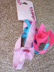 Neu mit Etikett Claire's 3 weiche Stirnbänder mit Blumen - HOT PINK/TÜRKIS/HELLROSA - Bild 1 von 3