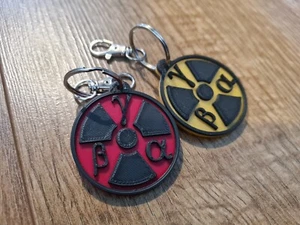 Símbolo de radiación alfa beta gamma llavero opciones de color personalizadas encanto de llave 45 mm - Imagen 1 de 8
