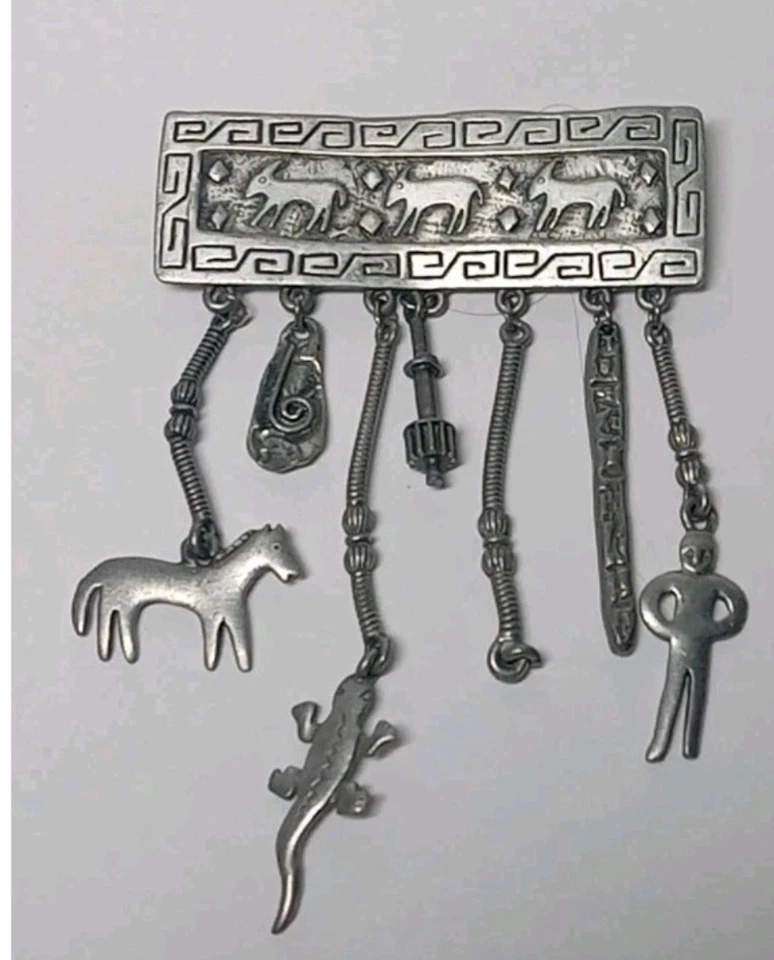 Vintage JJ. Jonette 1988 Southwestern Brass Charm Brooch Coyote Lizard Trible - Image 1 of 1