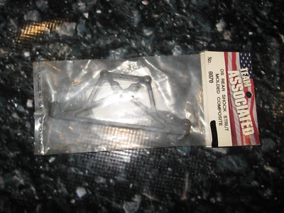 Vintage RC Associated RC10 Dual Sport DS Rear Shock Tower Plastic Black (1) 8870 - Image 1 of 2