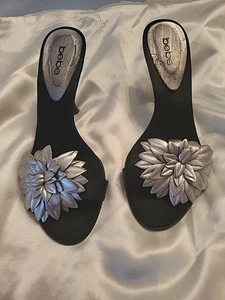 BEBE BLACK SATIN SILVER  FLOWER HEELS - Picture 1 of 6