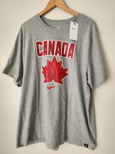 Nike The Nike Tee Canada Gr. 2XL Hockey Shirt Dark Grey Heather Neu mit Etikett - Bild 1 von 2