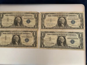 Four 1957 Silver Certificate Dollar Bills - Picture 1 of 8
