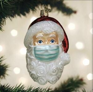 Genuine Old World Christmas Santa with Facemask Glass Ornament