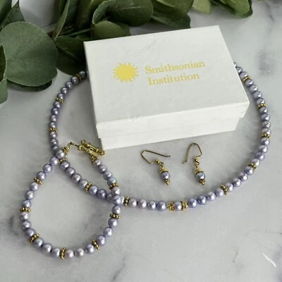 Smithsonian Institution Gold Tone Pearl Necklace, Bracelet, Earrings Set Toggle - Image 1 of 4
