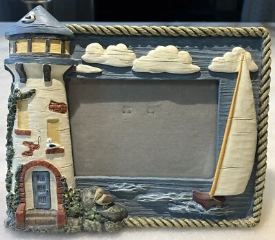 Marco de fotos Figi 1995 vintage velero náutico 3,5x5, casa de luz, navegación Foto 1 de 4