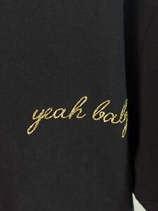 "Yeah Baby" Haftowana koszulka z krótkim rękawem w kolorze czarno-złotym bawełniana jersey