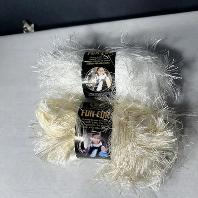 2 madejas de hilo de pestañas marca león piel divertida colores mezclados blanco y marfil Foto 1 de 4