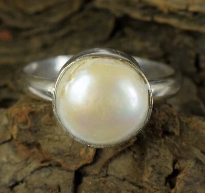 Anillo para hombre natural de piedras preciosas blancas del Mar del Sur de 10 quilates con forma redonda Foto 1 de 4