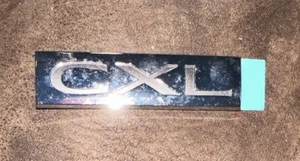 2008-2011 BUICK ENCLAVE CXL EMBLEM REAR LIFTGATE LIFT GATE Nos - Picture 1 of 2