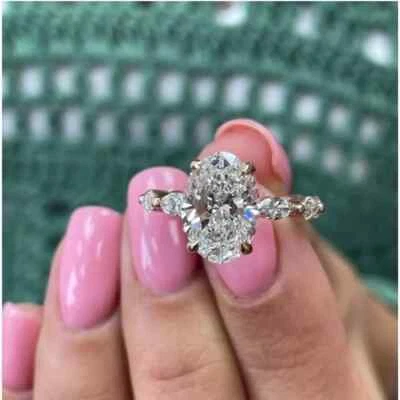 Anillo de compromiso solitario de diamantes cultivados en laboratorio EF/VS1 de corte ovalado de 3,20 quilates de oro rosa de 14 quilates Foto 1 de 4