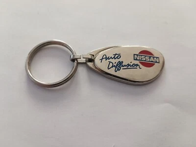 Porte clés Automobile NISSAN Garage AUTO DIFFUSION Keychain Vintage - Photo 1/2