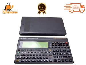 Calculatrice électronique Sharp PC-E500 - Photo 1/13