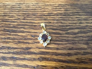 Vintage Gold Tone Pendant Red Gem in Center Clear Gems Around Oval - Picture 1 of 1