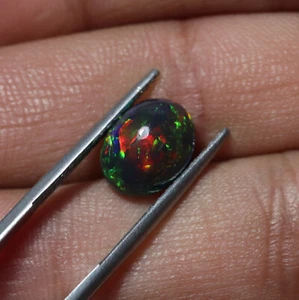 2.6 Cts 11.1x8.7 MM Natural AAA Multi Fire Smoked Black Ethiopian Opal Oval Gem - Picture 1 of 8