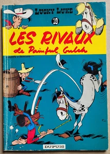 Lucky Luke 19 Les rivaux de Painful Gulch MORRIS GOSCINNY éd Dupuis rééd souple - Bild 1 von 4