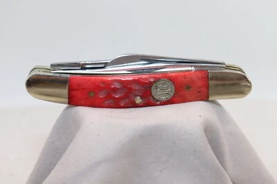 Cuchillo de bolsillo Frost Cutlery Whittler 1972-2001 naranja hueso plantilla alemán SS Foto 1 de 4