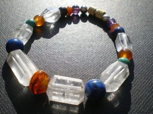 1 Reinigungsarmband aus Quarz, Lapislazuli, Bernstein, Amethyst, Türkis, Cornalin... - Bild 1 von 1