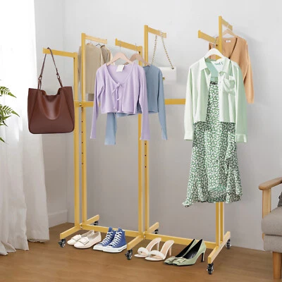 Estante de exhibición ajustable para ropa de 6 brazos con ruedas Foto 1 de 4