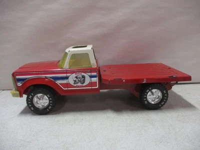 Camión con plataforma de estacas Nylint Farms Foto 1 de 4