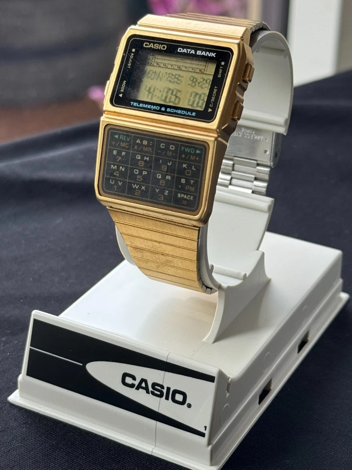 Orologio CASIO Vintage Calcolatrice Banca Dati DBC-610G Cassa Oro Cinturino Acciaio - Immagine 1 di 4