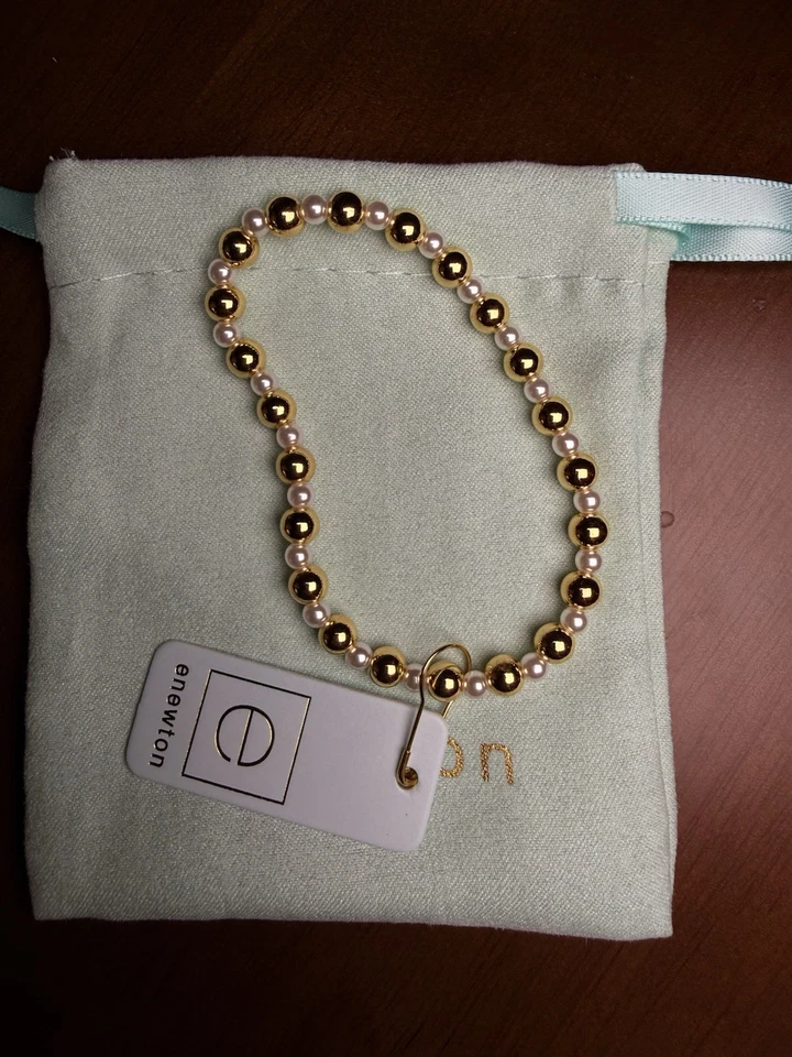 Pulsera Enewton Oro Perla Cuentas Con Bolsa para el Polvo Foto 1 de 3
