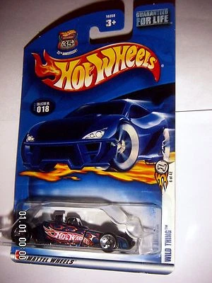Hot Wheels 2003 First Editions  Tire Fryer on Wild Thing Card  Error Pack  1:64 - Image 1 of 2
